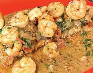 Cerdo al vino y salmón en salsa de mostaza.